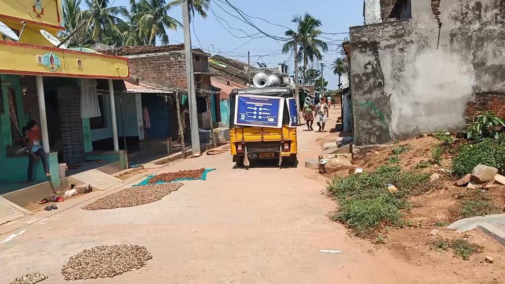 A truck equipped with loudspeaker delivers Covid-19 awareness information